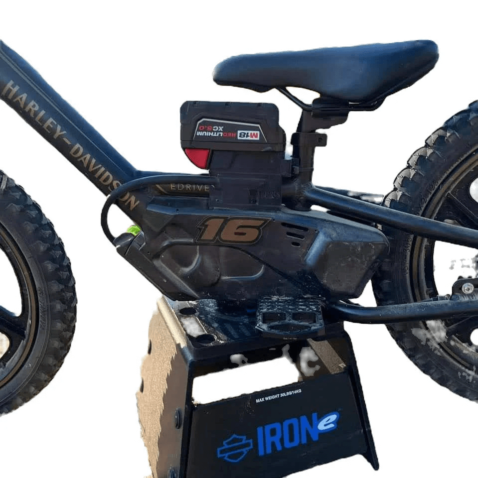 STACYC 12eDRIVE with Milwaukee battery attached, showcasing battery adapter installation on an electric bike.