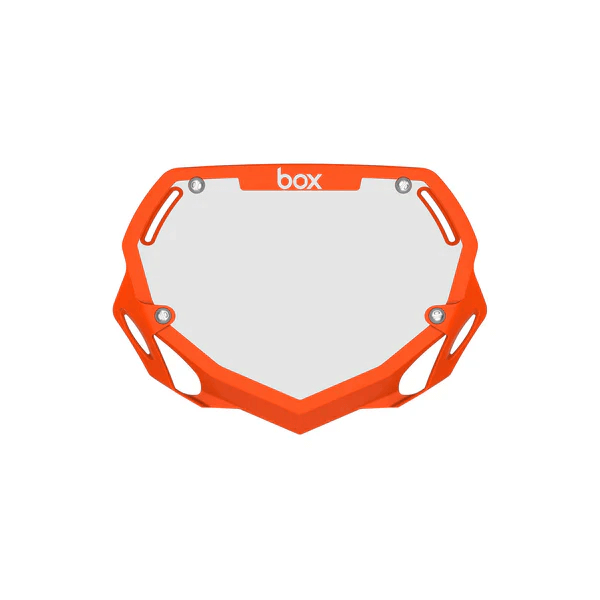 Box Two Number Plate in vibrant orange with aerodynamically designed vents for reduced drag.